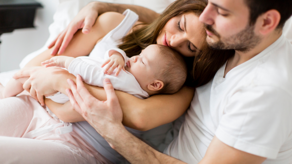 couple holding a baby